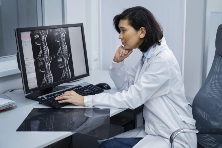 doctor-looking-ct-scan-1024x683